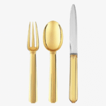 BAYONNE cutlery collection. It has fascinated artists in search of perfection since Antiquity. In geometric terms, the golden ratio refers to the relationship between two quantities a and b, such that a/b = (a + b)/a. Silversmith-cum-artist JEAN PUIFORCAT also incorporated mathematics into his creative eloquence: spheres, cones and cylinders, among other curving shapes, punctuate his life's work.  JEAN PUIFORCAT thus began to delve deeper into the ‚Äúdivine proportion,‚Äù as the ratio is sometimes called, to bring his silver creations ever closer to perfection. These mathematical explorations led to Art Deco spoons with a captivating particularity: when the bowl is placed on a fingertip, the stem floats in the air. One indication, among many others, of their perfect design. Evidence as well that the golden ratio and sterling silver go together beautifully.