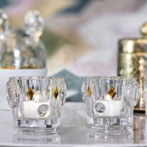 FAUNACRYSTOPOLIS BIRD votive. A little gem for the home, placed alone or with others, the BIRD crystal candle holder signed JAIME HAYON infuses a touch of fantasy and originality into any interior. Geometric lines, golden diamond-shaped eyes, an interplay of sizes and patterns, the bird candle holder embodies the humor and unique style of JAIME HAYON. A joyful and refined gift to brighten up everyday life!