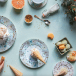 F√âERIE collection by MICHA√âL CAILLOX, who wanted a festive, celestial and solar decor. An explosion of patterns like a firework ... With a starry sky of small dandelion flowers, carrot flowers, clovers and wreaths of cherry blossoms. The hummingbird and the butterflies twirl, they are attracted by the light and the gold shards. A moving nature, joyful and bright.