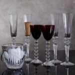 MILLE NUITS FLUTISSIMO. The Baccarat clear crystal FLUTISSIMO is designed by MATHIAS as part of Baccarat‚Äôs MILLE NUITS collection. VEGA RHINE wine glases, MASSENA ice bucket.