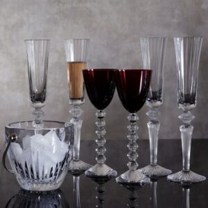 MILLE NUITS FLUTISSIMO. The Baccarat clear crystal FLUTISSIMO is designed by MATHIAS as part of Baccarat‚Äôs MILLE NUITS collection. VEGA RHINE wine glases, MASSENA ice bucket.