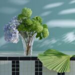 GINKGO VASE S. The vase‚Äôs immaculate silhouette fans out into a resplendent translucent arc. It is cut in a continuous, uninterrupted span of Baccarat clear crystal: a striking piece, amplified all the more by its considerable size. The GINKGO vase is capable of rendering any floral arrangement into a true botanical showcase, allowing the stems to spread amply and the buds to flourish freely. It is also an immaculate piece unto itself thanks to its a skillful showcase of craftsmanship.