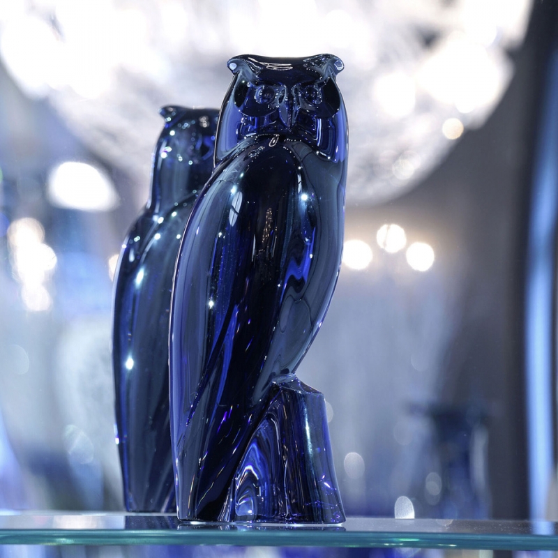 The EAGLE-OWL, a majestic sculpture of light, is a new addition to the Baccarat animal collection. A symbol of wisdom and intelligence, the EAGLE-OWL is Europe‚Äôs largest nocturnal bird of prey. Designed by the Czech sculptor JAN TESAR and crafted by the manufactory‚Äôs artisans from a massive block of crystal, the night bird takes on the Midnight blue colour of twilight. A feat of technical prowess, the sculpture is dramatic in size to reflect the bird‚Äôs inner strength. With a remarkable silhouette and piercing eyes, it sublimely enhances every surrounding with its glowing presence. An exceptional piece for collectors.