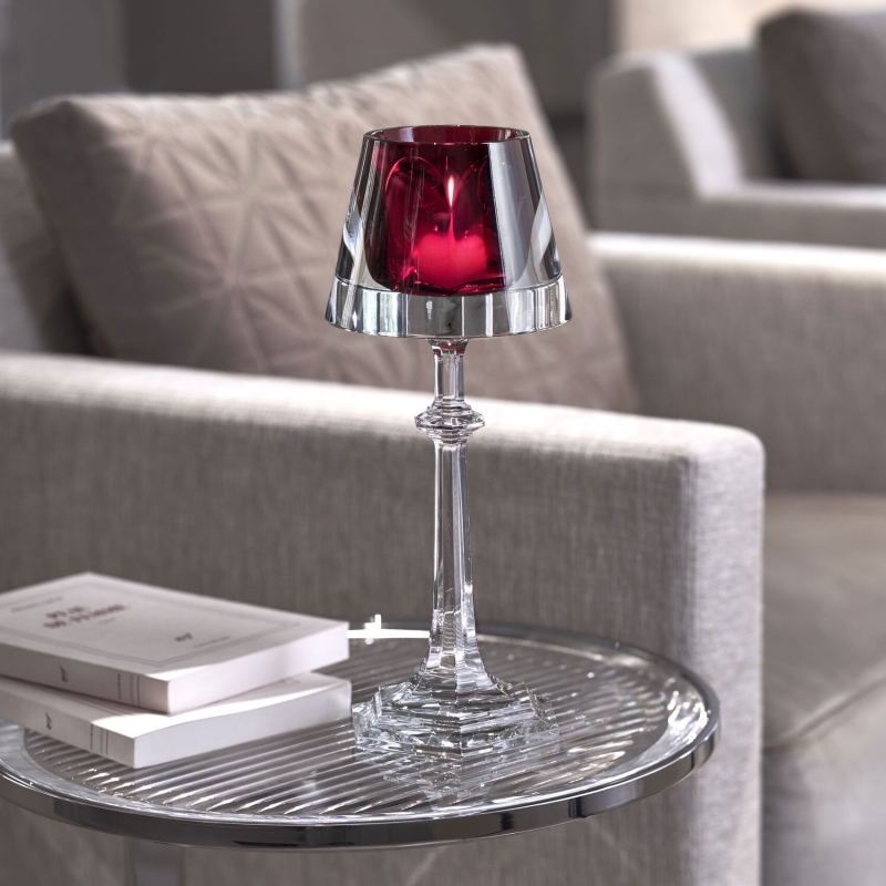 HARCOURT MY FIRE candlestick red. Set in a transparent light-shade, a HARCOURT red goblet now serves as a votive. Filtered by magic crystal, the candle creates an enchanting atmosphere. A collector's item for all lovers of creative design. Price ‚Ç¨750