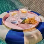 Clear crystal HARMONIE tumbler has a marvelously linear silhouette that would be ideal for any stocked bar.