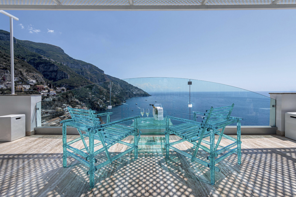 A'MARE table designed by  JACOPO FOGGINI.