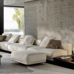 HORIZONTE modular seating system by MARCIO KOGAN / STUDIO MK27, designed 2022.It is not only the dimensions that characterise these modules, but also their unprecedented softness, capable of maintaining a precise formal aesthetic, despite their welcoming sinkable effect. Comfort is in fact guaranteed by an innovative technology that uses pocketed springs inserted in variable-density polyurethanes that allow the memory of the shapes to be maintained and the seat to return to its original form, modelling itself to the shape of the user.