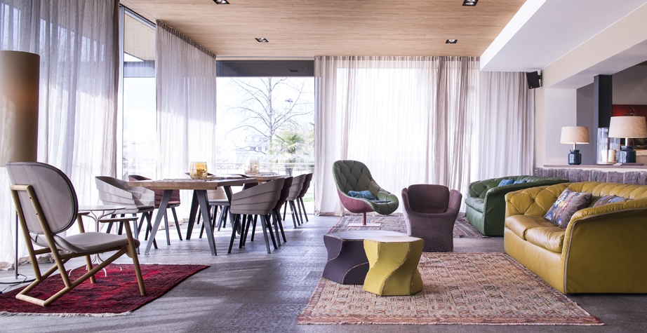 BOHEMIAN SOFA AND ARMCHAIR, BLOOMY SMALL ARMCHAIR, RIFT CHAIR AND KLARA ARMCHAIR BY PATRICIA URQUIOLA; TWIST AGAIN STOOL BY KARMELINA MARTINA - HOTEL MUCHELE, MERANO, ITALY, 2015.  INTERIORS: MOROSO CREATIVE TEAM WITH ARCHITEKTEN STEPHAN MARX ELKE LADURNER ARCHITECTURE: ARCHITEKTEN STEPHAN MARX ELKE LADURNER