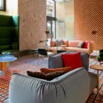 MAFALDA SMALL ARMCHAIR AND TENDER SOFA BY PATRICIA URQUIOLA - HOTEL ROOM MATE GIULIA MILAN, ITALY, 2016  PHOTO CREDIT: RICARDO LABOUGLE