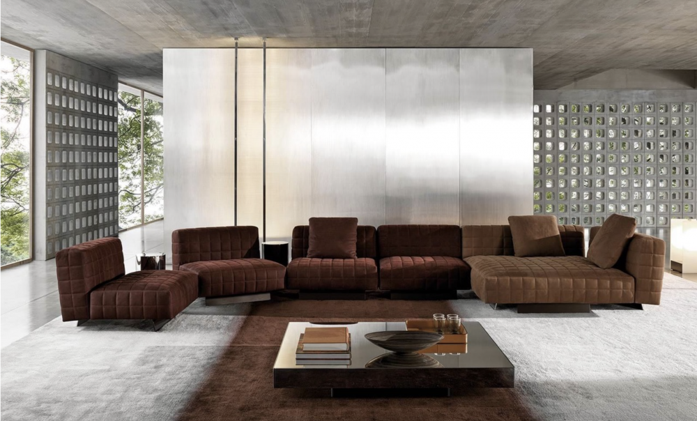 TWIGGY modular seating system by RODOLFO DORDONI , designed 2022.TWIGGY is the new family of seats that stands out for its ability to revolutionise living spaces with an unprecedented ideal of timeless beauty.TWIGGY presents itself with different elements, always distinguished by MINOTTI's sophisticated sartorial taste. The family originated as a single armchair in the Small, Large and Deep versions, with and without armrests, but embellished with stitching that reveals the depth of the brand's manufacturing know-how combined with its great ability to make even the most sculptural seats extremely comfortable.