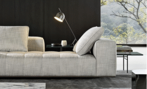 GOODMAN modular seating system by RODLOFO DORDONI , designed 2022.Compactness and softness come together in the same sofa concept, making it suitable for a more formal use both also for extreme relaxation; from the most traditional configurations to the more dynamic ones made possible by a series of individual components that animate the living space: end units, corner units, central units, chaise-longues. Each element is like a piece of a jigsaw puzzle to be joined with others to define its creator‚Äôs own home environment. Compact volumes capable of adapting to the space, the needs and tastes of the individual, as well as to the evolution of his or her living requirements over the years, easily changing into new compositions.