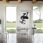 KAYO EXTENSIBLE TABLE IN CURVED GLASS BY SATYENDRA PAKHALƒí