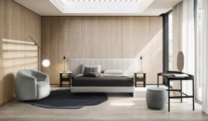 KILLIAN bed designed by E-EGGS. KILLIAN is a bed with a firm and welcoming presence. The strong and bold lines are soft and elegant at the same time, which is particularly evident in the monolithic design of the legs. Available with a narrow or wider headboard that welcomes the bedside table. The bed is available in the suspended bed-ring version or in the container bed-ring version.