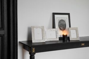 Silver plated picture frames and candle JARDIN D'EDEN - designer MARCEL WANDERS