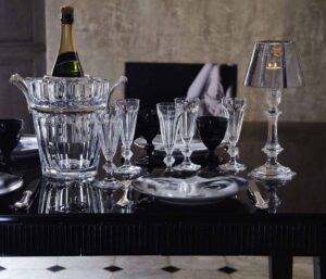 Crystal champagne glasses and champagne cooler HARCOURT; candle holder OUR FIRE by PHILIPPE STARCK