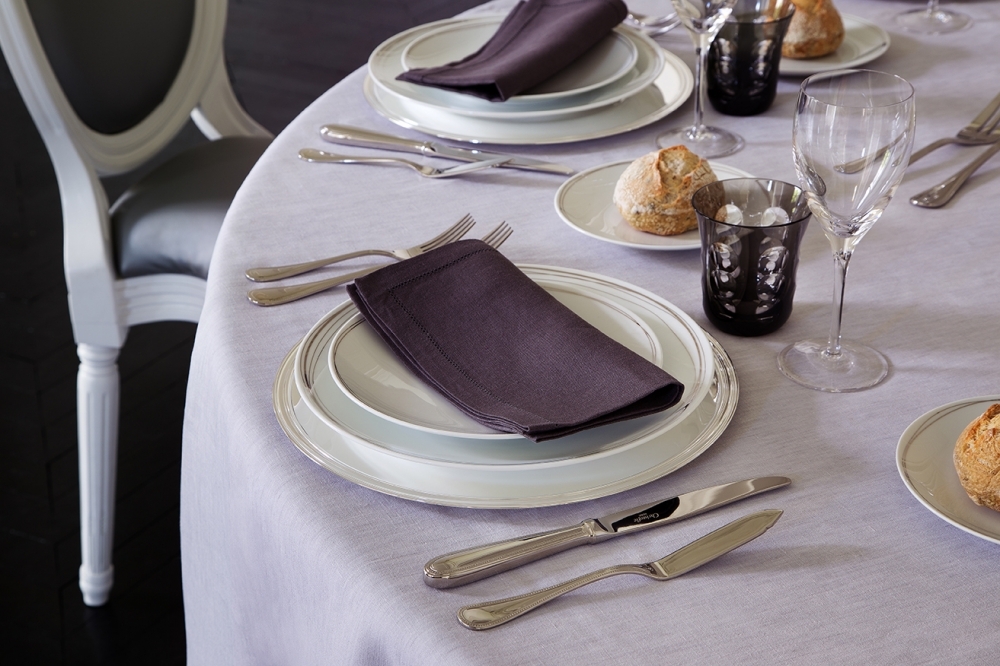 Silver plated flatware collection PERLES, porcelain plates VERTIGO - DESIGNER ANDR√âE PUTMAN, wine glasses ALBI, water glass KAWALI.