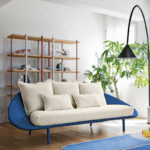 LEM sofa designed by FRANSESCO BEGHETTO. LEM is soft and sinuous sofa; the tubular structure with the aid of straps, is fully covered in fabric without using foams. Soft seat cushions and back rest on the shell fabric to ensure maximum comfort. The series LEM is complete of four variants, two or three seater sofa, armchair and ottoman.