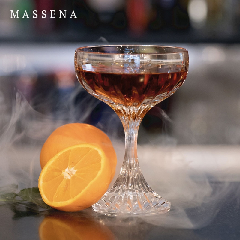 The MASSENA crystal champagne coupe showcases Baccarat‚Äôs meticulous craftsmanship.