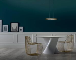 SIGN FILO CHAIR by PIERGIORGIO CAZZANIGA, designed in 2017.The SIGN chair is celebrating its anniversary creating a new product with great impact and personality.  The new SIGN FILO is a perfect combination of design and craftsmanship and it is built up like a refined jewel. In fact the creative process of this chair reminds the ancient goldsmith‚Äôs technique of filigree that is carried out by interweaving and welding thin wires of precious metals. Forty-five meters of steel wire in four different diameters, draw SIGN FILO‚Äôs silhouette.