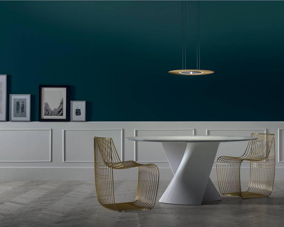 SIGN FILO CHAIR by PIERGIORGIO CAZZANIGA, designed in 2017.The SIGN chair is celebrating its anniversary creating a new product with great impact and personality.  The new SIGN FILO is a perfect combination of design and craftsmanship and it is built up like a refined jewel. In fact the creative process of this chair reminds the ancient goldsmith‚Äôs technique of filigree that is carried out by interweaving and welding thin wires of precious metals. Forty-five meters of steel wire in four different diameters, draw SIGN FILO‚Äôs silhouette.