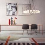 TENSE MATERIAL WOOD by PIERGIORGIO CAZZANIGA, MICHELE CAZZANIGA, designed in 2016‚Äì2019. ‚ÄúA smart beauty, resulting from a thought and a know-how capable of transmitting a deep emotion through a wise accentuation of the peculiarities of the materials used‚Äù. PIERGIORGIO CAZZANIGA describes in this way TENSE MATERIAL, a collection of tables available in 5 heights and 36 sizes, capable of achieving large dimensions, up to 4 meter long, always keeping a perfect top tension. Different wood grain combinations, various shades and emotions to be touched. TENSE MATERIAL is available in three different wood essences: natural oak, carbonized oak and national walnut.