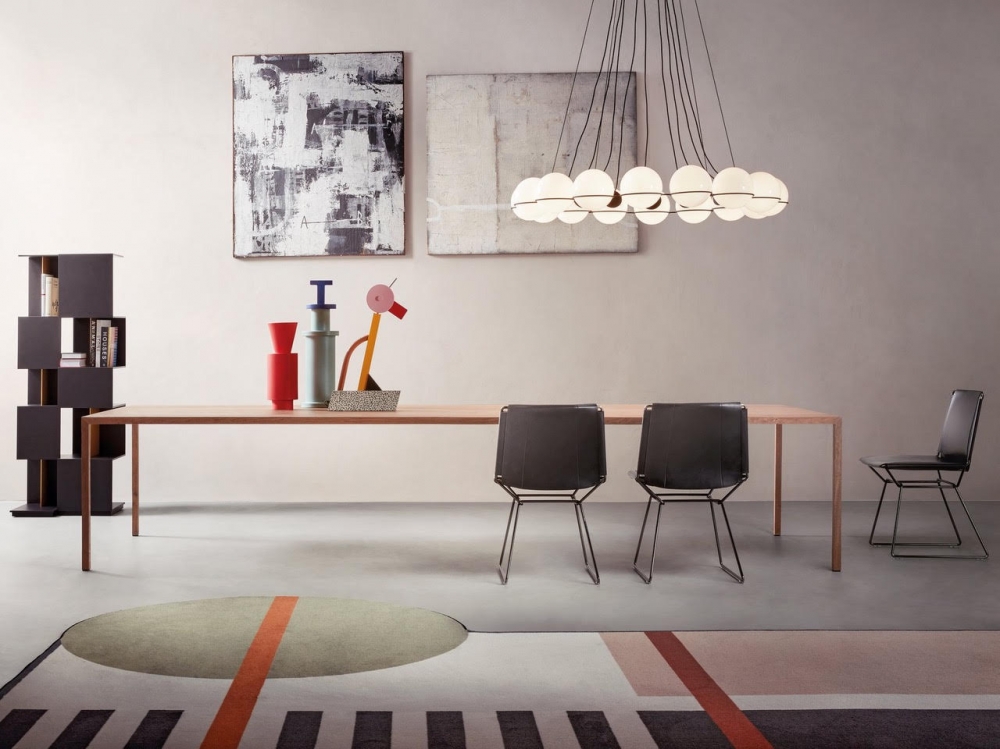 TENSE MATERIAL WOOD by PIERGIORGIO CAZZANIGA, MICHELE CAZZANIGA, designed in 2016‚Äì2019. ‚ÄúA smart beauty, resulting from a thought and a know-how capable of transmitting a deep emotion through a wise accentuation of the peculiarities of the materials used‚Äù. PIERGIORGIO CAZZANIGA describes in this way TENSE MATERIAL, a collection of tables available in 5 heights and 36 sizes, capable of achieving large dimensions, up to 4 meter long, always keeping a perfect top tension. Different wood grain combinations, various shades and emotions to be touched. TENSE MATERIAL is available in three different wood essences: natural oak, carbonized oak and national walnut.