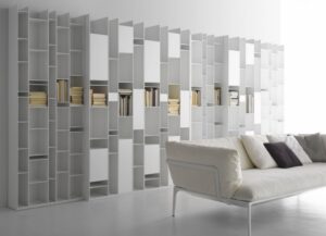 RANDOM BOOKSHELVES by NEULAND INDUSTRIEDESIGN, designed in 2017. An icon, an industrial masterpiece with an extraordinary irregular structure.  A piece of furniture that, when it was born in 2005, revolutionised the concept of bookshelf, turning it into a design sculpture. This is the visiting card of RANDOM by NEULAND INDUSTRIEDESIGN, created all white at the beginning. Then, it came in different variants up to the colour of the 2C-3C release. A product that, with its geometries, favours light games, while with its modularity adapts to any living space, from the widest to the most reduced ones. Over the years, RANDOM has extended its family, changing the concept of storage. For instance, with RANDOM BOX and RANDOM CABINET, objects can be both stored and shown off, while modules of different depth give an effect of considerable dynamism. Even today, MDF Italia RANDOM expresses an extraordinary communication energy and it is one of the icons of the whole design world.