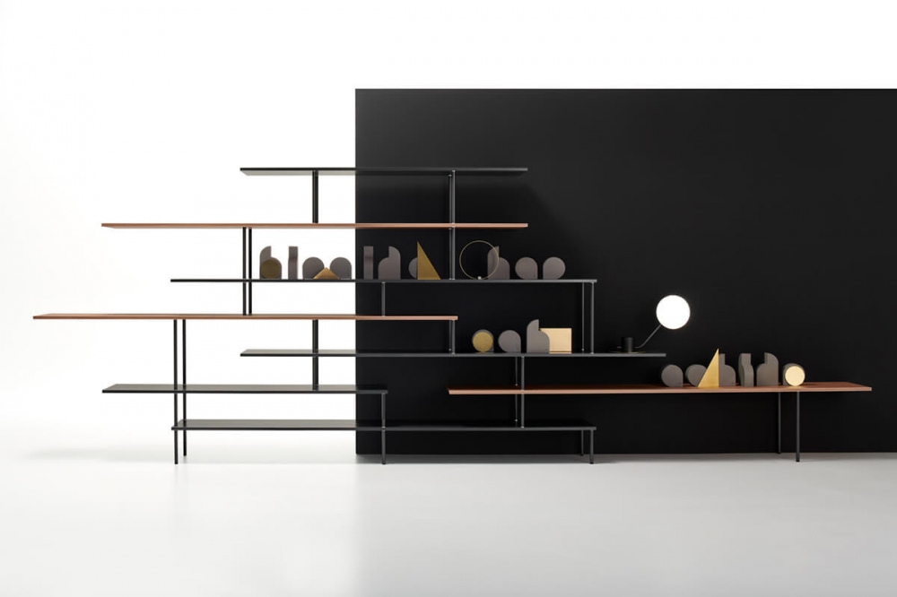 SUPER_POSITION by Jean Nouvel Design, designed in 2018‚Äì2019. Formal lightweight, graphic sign, simple design, harmonious aesthetics, essentiality are the hallmarks of SUPER_POSITION bookcase family, designed by JEAN NOUVEL DESIGN. ‚ÄúOverlapped lines are a tribute to the lightness of horizontality. Uninterrupted vertical lines cross the shelves, which extend like small diving boards into the void. Objects, vases and sculptures can express their differences of scale in empty spaces, in the niches in the middle or on the ends of the overlapped lines.‚Äù JEAN NOUVEL SUPER_POSITION is available in a monochromatic version, two-tone or two-material version.