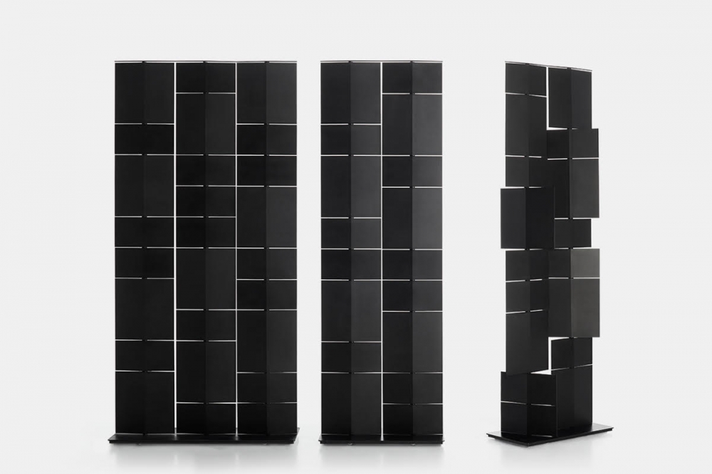 DEVIDE IT by PITSOU KEDEM, designed in 2020. In today's dynamic world, designing products that adapt to change is essential. Design and functionality must go hand in hand to offer life to solutions that are not only aesthetically beautiful, but also able to adapt to the transformations we are witnessing. This contributed to change and redraw domestic and working spaces: people work in a pub, at home or share common workspaces. DIVIDE IT was created to meet these needs. Designed by the Israeli architect PITSOU KEDEM, who has already created the Mirror Lines collection for MDF Italia and signed several stunning residential projects, it is a dynamic product that adapts to every requirement and allows you to divide working spaces and home environments. At the same time, it maintains the sense of contiguity between adjacent rooms and creates suggestive and elegant perceptions. DIVIDE IT is a furniture complement that moves easily and can change position at any time the user wishes. Available in two different sizes, it is composed of several panels which, rotating on an axis of 360 degrees, can be positioned to determine the passage of light and sound.