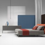 YALE BED by JEAN-MARIE MASSAUD, designed in 2018. MASSUAUD‚Äôs latest creations were conceived for a functional and contemporary home, expressing a style and a way of living in which formal simplicity does not exclude creativity, quality, innovation and a sophisticated aesthetics. The designer extends YALE X‚Äôs project idea to the night area, proposing again YALE‚Äôs softness and comfort for the headboard, as well as the refined aesthetics of the sofa‚Äôs stand as the hallmark of the bedframe. The bed concept means a welcoming headboard, capable to offer the best comfort to relax, read or watch TV, a good mattress and a comfortable pillow.