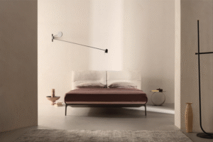 YALE BED by JEAN-MARIE MASSAUD, designed in 2018. MASSUAUD‚Äôs latest creations were conceived for a functional and contemporary home, expressing a style and a way of living in which formal simplicity does not exclude creativity, quality, innovation and a sophisticated aesthetics. The designer extends YALE X‚Äôs project idea to the night area, proposing again YALE‚Äôs softness and comfort for the headboard, as well as the refined aesthetics of the sofa‚Äôs stand as the hallmark of the bedframe. The bed concept means a welcoming headboard, capable to offer the best comfort to relax, read or watch TV, a good mattress and a comfortable pillow.