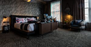 PERF CABINET, CHUBBY CHIC ARMCHAIR AND GIMME SHELTER BED BY DIESEL CREATIVE TEAM - MEGARO HOTEL LONDON, UK, 2018  DESIGNER: BLU SKY HOSPITALITY PHOTO CREDIT: MEGARO HOTEL