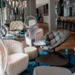 REDONDO ARMCHAIR, BOHEMIANARMCHAIR, FJORD STOOL AND BLOOMY LOW TABLE BY PATRICIA URQUIOLA - MOTEL ONE STUTTGART, GERMANY, 2019  INTERIORS: MOTEL ONE ARCHITECTURE: MOTEL ONE PHOTO CREDIT: MOTEL ONE