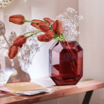 Like a delicately cut precious stone, the Baccarat OCTOGONE vase is a true gem. The signature Baccarat octagon from its chandeliers has been reinvented as a stunning vase. Its clear-cut lines, corners and curves beautifully reflect the surrounding light, showcasing fresh-cut flowers beautifully. Designer THOMAS BASTIDE has created an eye-catching delight in vibrant red. Its elegant style warms up your home and adds a special flair to contemporary home d√©cor.