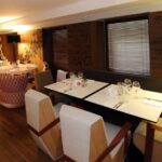 SILVER LAKE AND JUJU LITTLE ARMCHAIRS,  FJORD CHAIR AND TABLE - CHAIRONE APPLE TORINO, ITALY, 2011  INTERIORS: FULVIO FANTOLINO PHOTO CREDIT: RALPH HILLERT