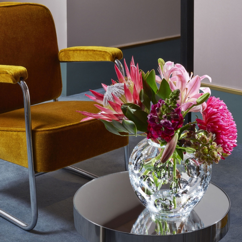 H√âRITAGE PONTIL vase. This round vase cut with large round cuts is a tribute to the original design that GEORGES CHEVALIER.The hollowed-out circular motif cut in the clear crystal creates an kinetic optical effect that is typical of the period.