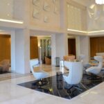 TAKE A LINE FOR A WALK ARMCHAIR BY ALFREDO H√ÑBERLI, GEMMA ARMCHAIR BY DANIEL LIBESKIND, KUB LOW TABLE AND KUB STOOL BY NENDO, TWIST AGAIN STOOL BY KARMELINA MARTINA - ROYAL CONTINENTAL HOTEL DUBAI, UAE, 2017  INTERIORS: ARC INTERNATIONAL, LENA HASBANI PHOTO CREDIT: SUNIL PAUL