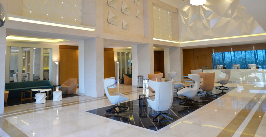 TAKE A LINE FOR A WALK ARMCHAIR BY ALFREDO H√ÑBERLI, GEMMA ARMCHAIR BY DANIEL LIBESKIND, KUB LOW TABLE AND KUB STOOL BY NENDO, TWIST AGAIN STOOL BY KARMELINA MARTINA - ROYAL CONTINENTAL HOTEL DUBAI, UAE, 2017  INTERIORS: ARC INTERNATIONAL, LENA HASBANI PHOTO CREDIT: SUNIL PAUL