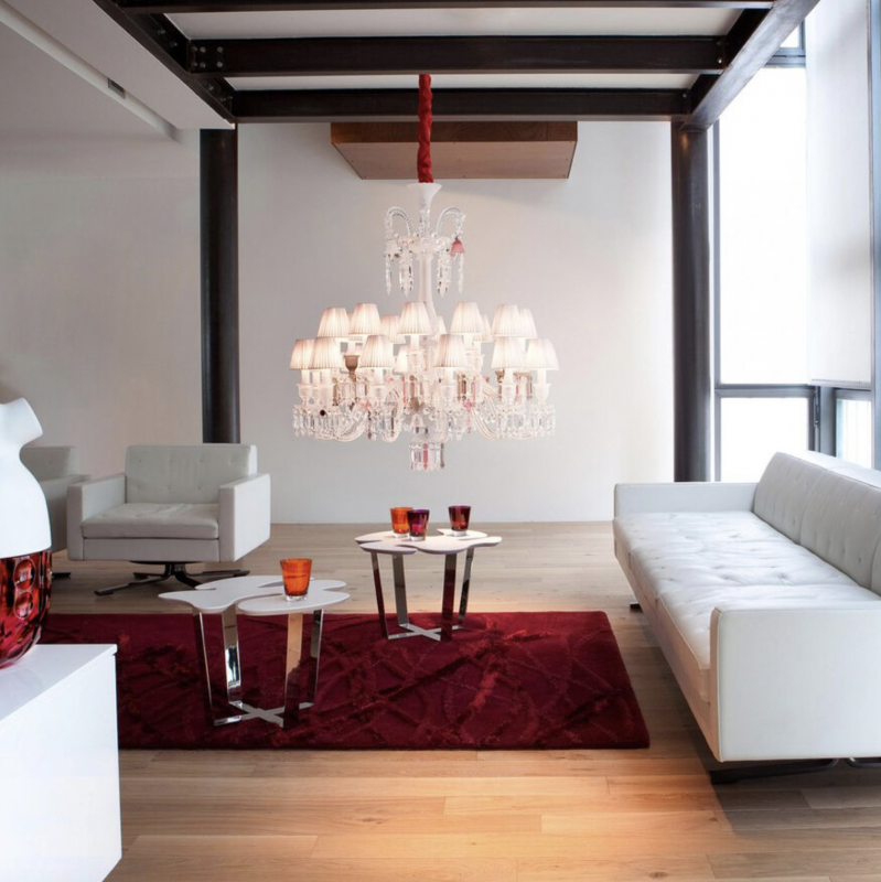 Z√âNITH FLOU, JE TE VOIS FLOU chandelier. The resplendent design, whimsically conceived of by the ever-inventive PHILIPPE STARCK mixes clear crystal, pink crystal and mist crystal alongside frosted ornaments. This particular color concept makes the Baccarat chandelier of appears ‚Äúunfocused‚Äù, evoking the effect of an out-of-focus camera lens, which in turn creates a stunning optical illusion. A romantic and poetic reinterpretation of Baccarat‚Äôs iconic Zenith chandelier, the ‚ÄúUnfocused‚Äù version also boasts a simplified silhouette. By suppressing most of the chains, the chandelier appears to possess a wonderful lightness. Also offered in black, the Unfocused Zenith chandelier is available by special order. Available in 2 Sizes and the number of lights ranges  from 6 to 24.