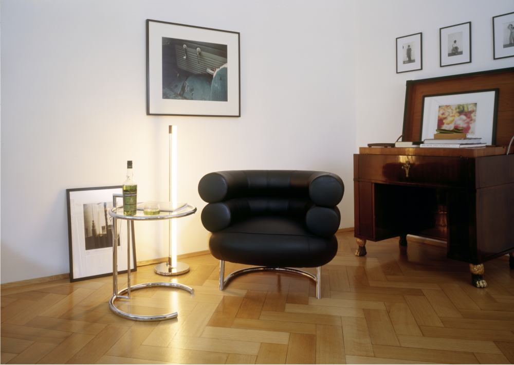 ADJUSTABLE Table E 1027 designed by EILEEN GRAY, 1927. This is the classic among classics. Its ingeniously proportioned, distinctive form has made this height-adjustable table one of the most popular design icons of the 20th century. It is named after the house E 1027 ‚ÄòMaison en bord de mer‚Äô that EILEEN GRAY built for herself and for her partner, JEAN BADOVICI. The code-name likewise comes from: E is for Eileen, 10 for Jean (J is the 10th letter of the alphabet), 2 for B(adovici) and 7 for G(ray).