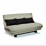 COLLI sofa bed designed by FRANZ RENDL.A laid-back sofa bed with an unusually invented design, COLLI is equally at home in a longue or guest room. With a wide range of sitting and reclining positions ‚Äì the back rest has five graduated stops ‚Äì COLLI is ideal for reading, watching television and relaxing. The sofa transforms into a comfortable bed with a simple hand movement. COLLI can be given a range of looks from elegant to sporty through the choice of covers and cushions, and this extremely popular model is still as popular as ever almost 30 years after its introduction.