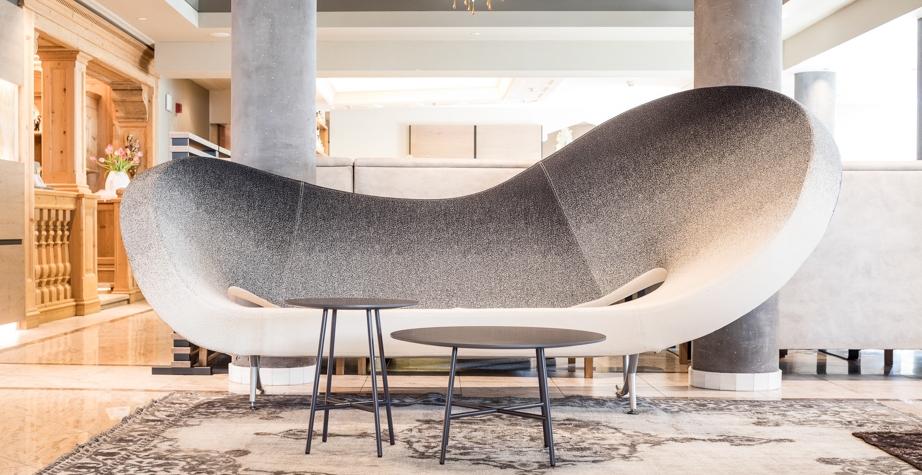 VICTORIA AND ALBERT SOFA BY RON ARAD AND TIA MARIA LOW TABLE BY ENRICO FRANZOLINI - SONNES RESORT NATURNO, ITALY, 2018  ARCHITECTURE: LOBBY PHOTO CREDIT: SONNEN RESTORT