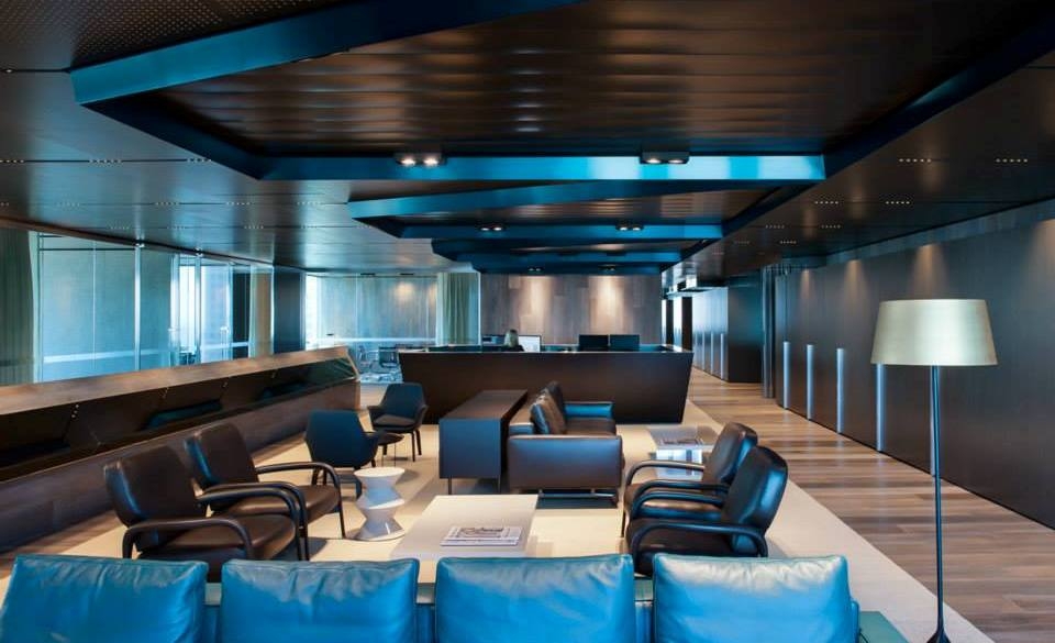 SHERMAN SOFAS AND BROOKS ARMCHAIRS UPHOLSTERED IN DARK BROWN LEATHER, YORK LOUNGE CHAIRS, AND THE STARR AND CESAR SIDE TABLES- MADDOCKS LAW OFFICES BY HASSELL DESIGN STUDIOS