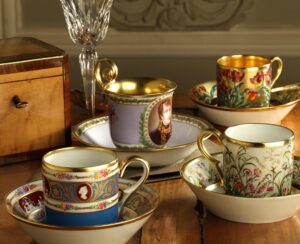 BERNARDAUD ROYALE - HISTORICAL PORCELAIN COFFEE CUPS: CATHERINE II DE RUSSIE, AUX FLEURS DES CHAMPS, BONAPARTE, AUX TULIPES