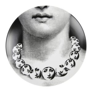 TEMA E VARIAZIONI WALL PLATE - NO. 107. THIS TEMA E VARIAZIONI WALL PLATE IS A TRULY UNIQUE PIECE OF ART FROM THE WORLD FAMOUS FORNASETTI BRAND. BEAUTIFULLY CRAFTED FROM PORCELAIN IT DEPICTS THE FACE OF OPERA SINGER LINA CAVALIERI DUPLICATED ONTO A CIRCULAR NECKLACE WORN BY HERSELF. CLASSICALLY INFLUENCED YET CONTEMPORARY IN STYLE, IT IS A STUNNING EXAMPLE OF THE DESIGNER‚ÄôS ICONIC STYLE & IT MAKES A FABULOUS GIFT IDEA FOR ANY OCCASION. DIAMETER:26CM