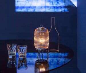 Inspired by the outline of some types of Japanese lantern, the C√âLESTE collection takes a new look at the rice grain elongated bevel cut. As a suspension or a wall light, placed on the ground or on its stand, these items provide a golden halo of light. Designer PHILIPPE NIGRO