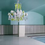 √âTRANGE Z√âNITH PARROTS. Imagined by PHILIPPE STARCK in collaboration with glassware artist ARISTIDE NAJEAN, the ¬´ Z√©nith sur la Lagune ¬ª adorned with the heads of deer is a magic combination where Baccarat crystal meets Murano glass. The Z√âNITH collection embraces the line of traditional crystal chandeliers developed by Baccarat since the first half of the 19th century. It is composed of beveled diamond cut elements and twisted branches known as ¬´ Bambou tors ¬ª or bamboo twists. Admired worldwide, since it was first created the Z√âNITH chandelier has continued to illuminate exceptional palaces and homes. Timeless and fascinating, it spans the ages, looking ever more fabulous with each new special order and each new interpretation by international designers. Limited and numbered edition, price ‚Ç¨86,200