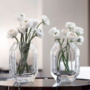 OCTOGONE vase designed by THOMAS BASTIDE. The signature of all Baccarat chandeliers, the octagonal tassel is here transformed into a vase. The clear-cut lines, corners and roundness are combined to reflect the light.