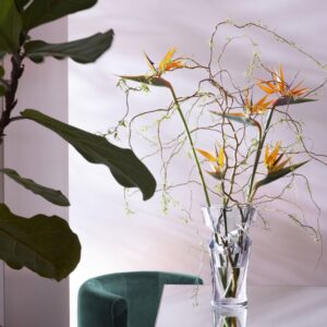 TORNADO VASE. The unexpected angular cuts refract the light off of sharply diagonal outlines, in this way highlighting Baccarat‚Äôs mastery of form. These artful incisions add an astonishing graphic richness to the line of the vase. The chiseled openings coil around the circumference of the vase in a poetic spiral, which amplifies the three-dimensionality of the luminous crystal. The vase‚Äôs wide circular neck structures any bouquet in any lovely floral configuration. The elegance of the vase adds splendor to any room. Its energy makes the vase an exquisite gift for any occasion. The vase is available in two sizes.