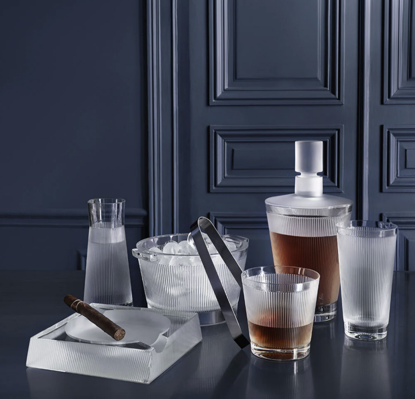 WINGEN crystal collection designed by REN√â LALIQUE. The ‚ÄúWINGEN‚Äù barware service is named after the village in Alsace where the Lalique Manufacture has been perpetuating its exceptional know-how. REN√â LALIQUE had already designed a stemware service with the same name in the 1920‚Äô, with a similar pattern. Displayed in a rhythmic rigor, the graphic lines in satin-finished crystal - emblematic of Lalique ‚Äì exhibit a timeless elegance.